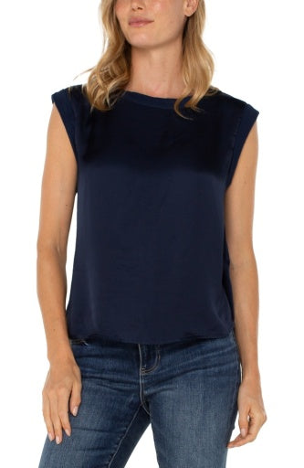 sleeveless woven to knit top